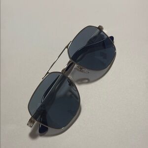 Persol Silver Sunglasses with Blue Lenses